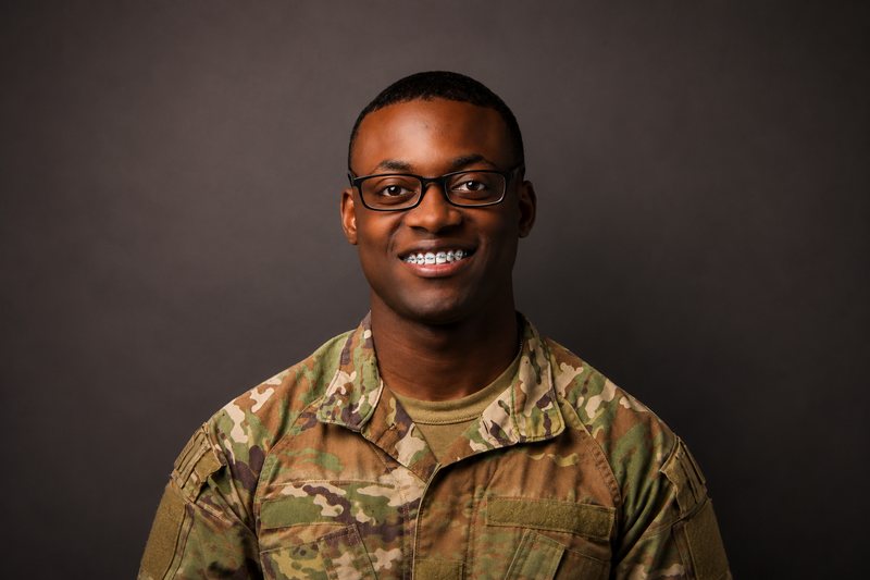 Smiling adult with braces