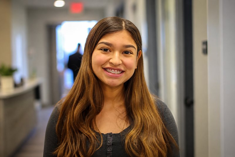 Smiling teen with braces